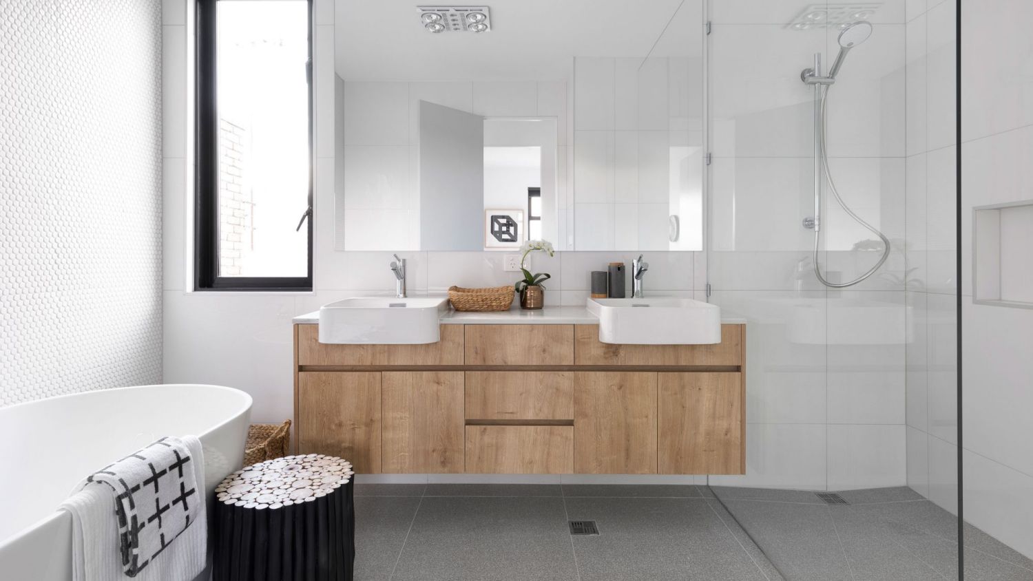Achieving the right combination of lighting makes all the difference to your bathroom's functionality.